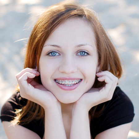 girl-smiling-with-braces-450x450